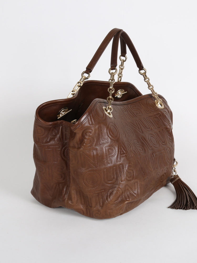 Whisper leather handbag Louis Vuitton Brown in Leather - 25471620