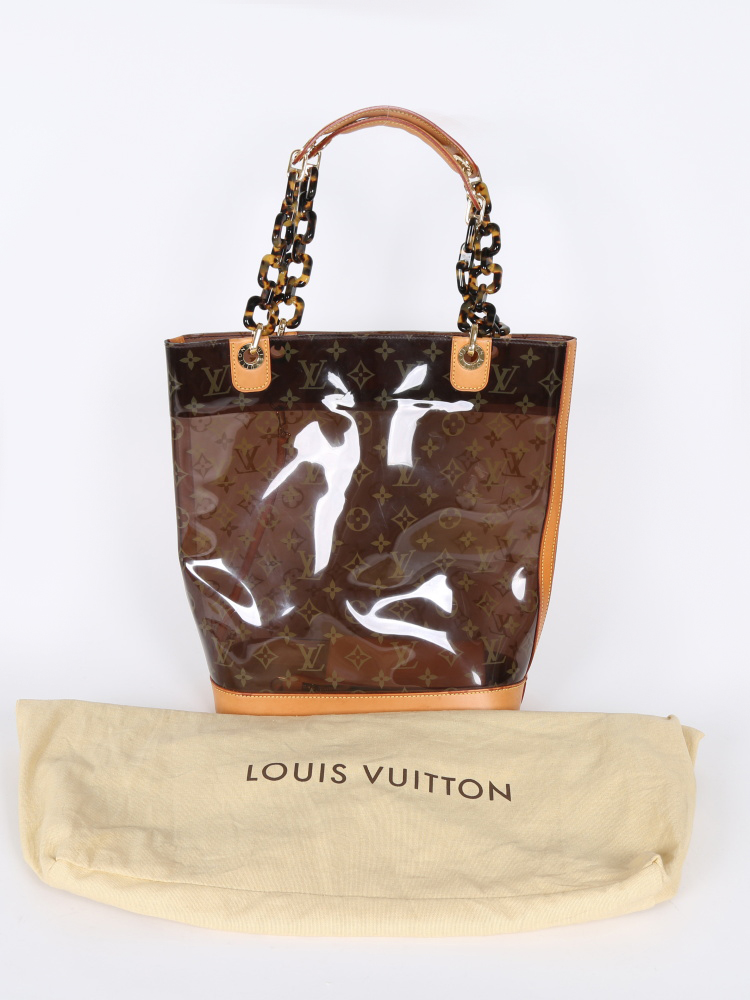 Louis Vuitton Ambre Sac Cabas Monogram Vinyl GM at 1stDibs  louis vuitton  beach bag plastic, louis vuitton beach tote, plastic louis vuitton beach bag