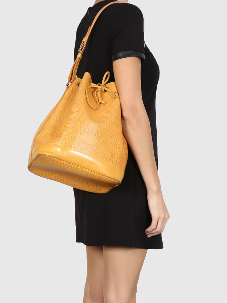 Sold at Auction: Louis Vuitton, Louis Vuitton Tassil Yellow Epi Leather Noe