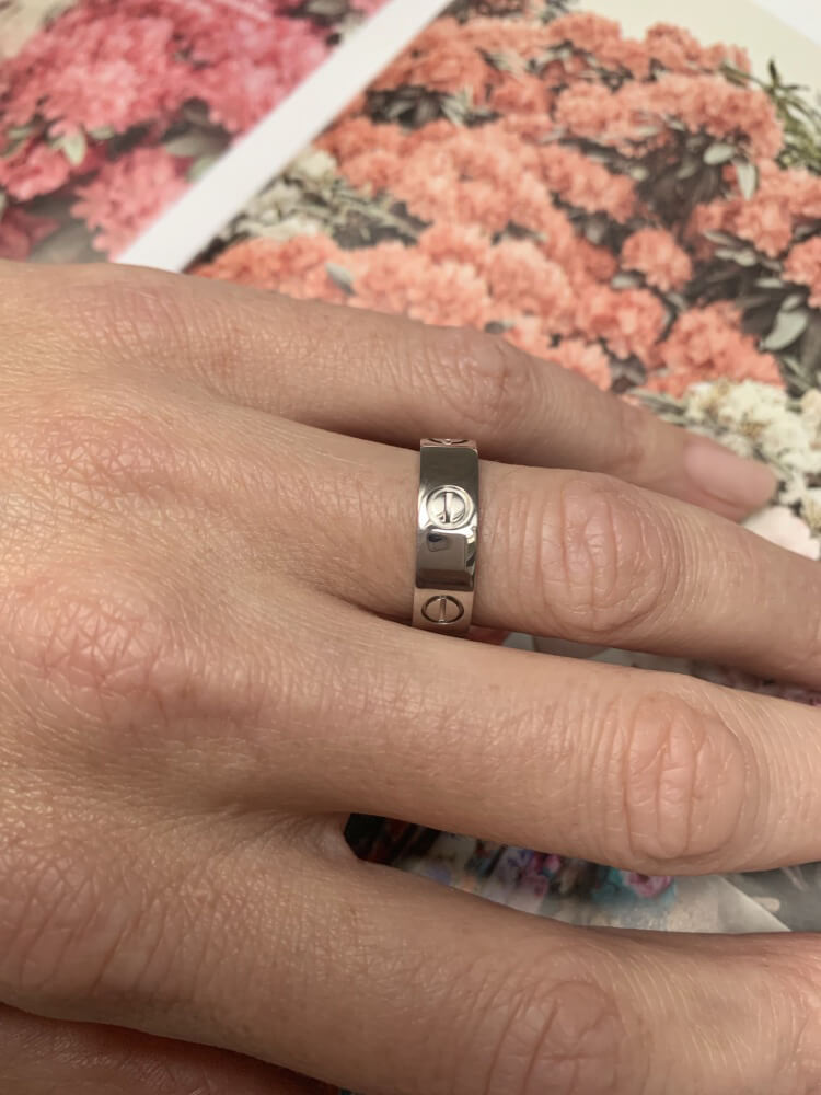 cartier love ring on hand