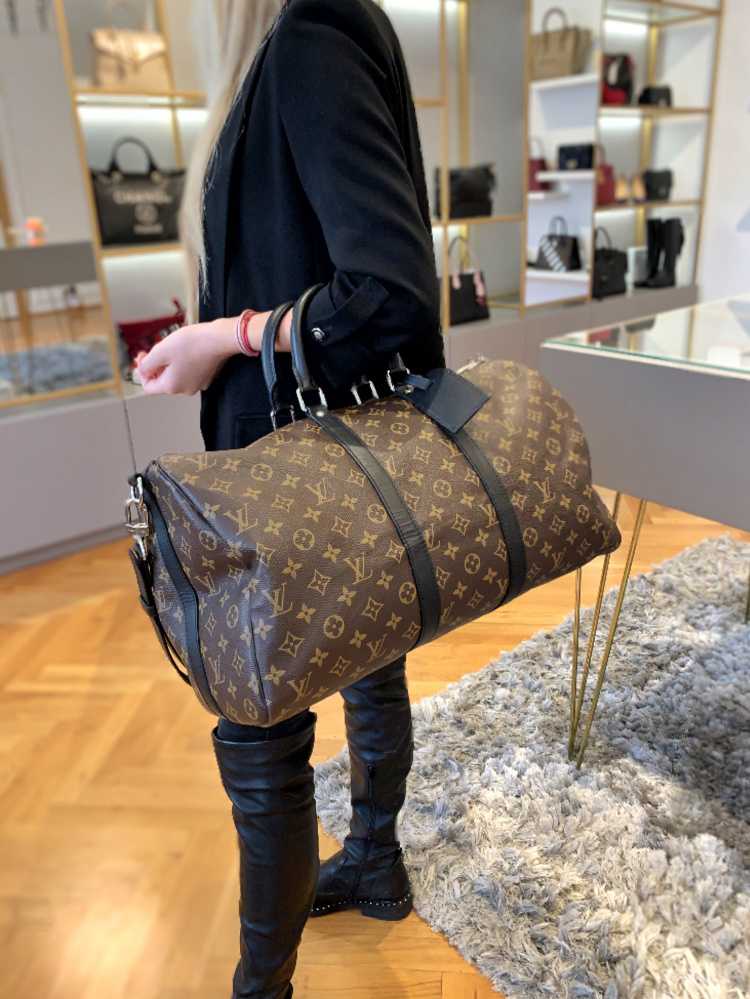 Shop Louis Vuitton MONOGRAM MACASSAR Keepall Bandoulière 45