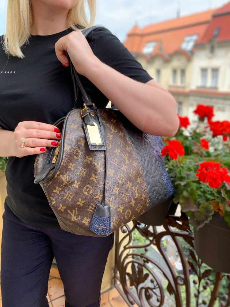 LOUIS VUITTON WOMEN'S BAG MELIE MONOGRAM LOGO BLACK CANVAS