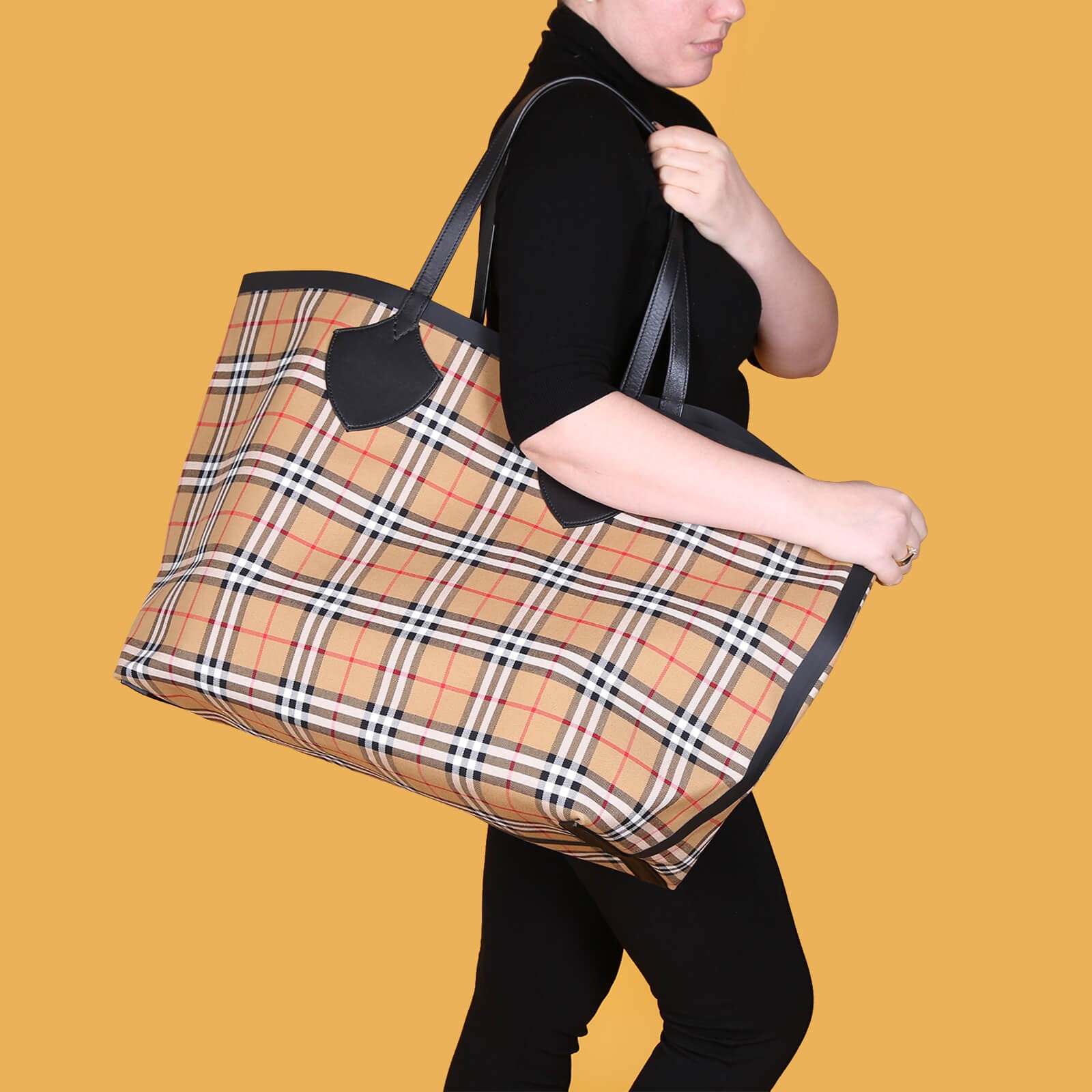 Burberry The Giant Reversible Tote In Canvas Check And Leather, $1,801, farfetch.com