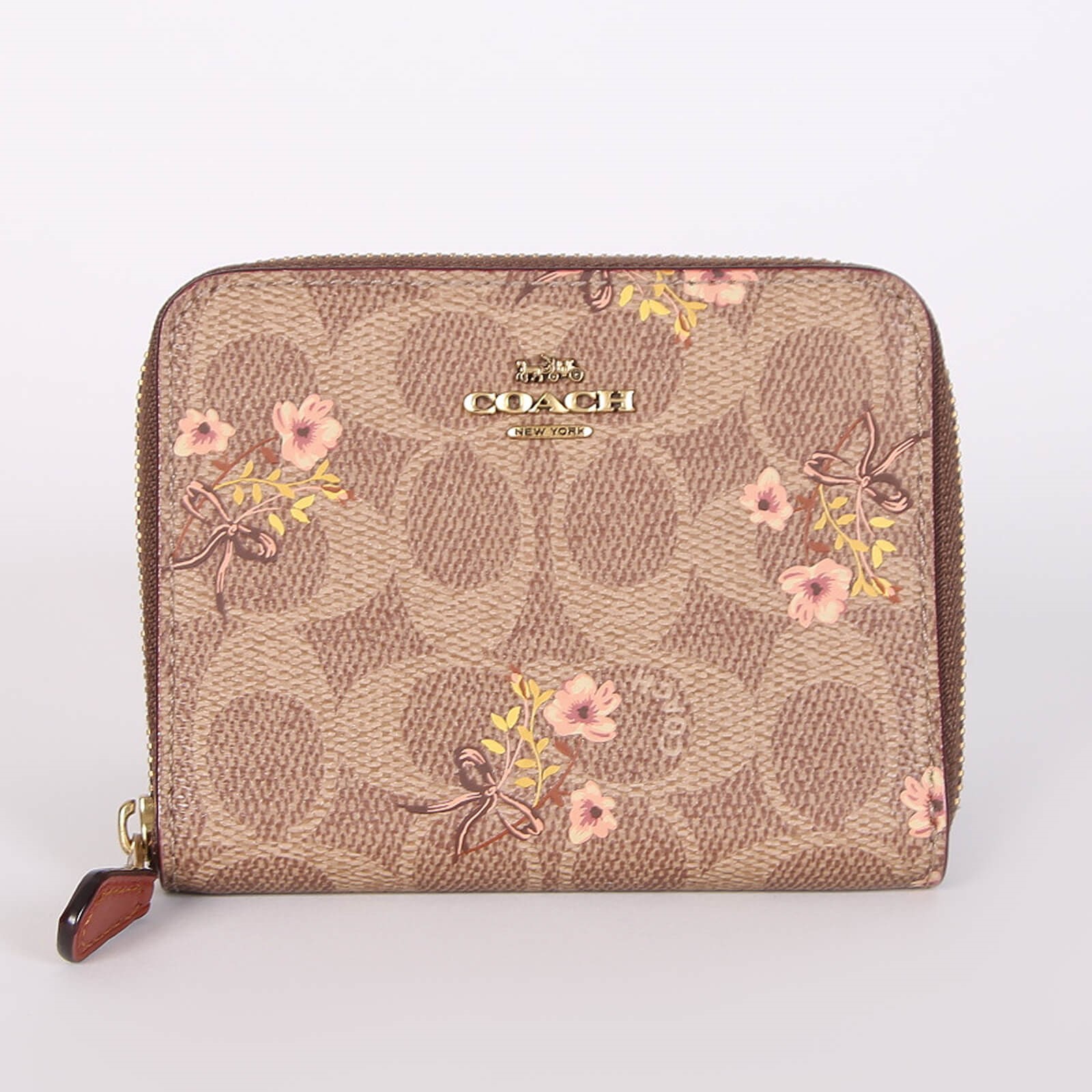 Coach Floral Bow Print Signature Canvas Small Zip Around Wallet www.luxurybags.eu